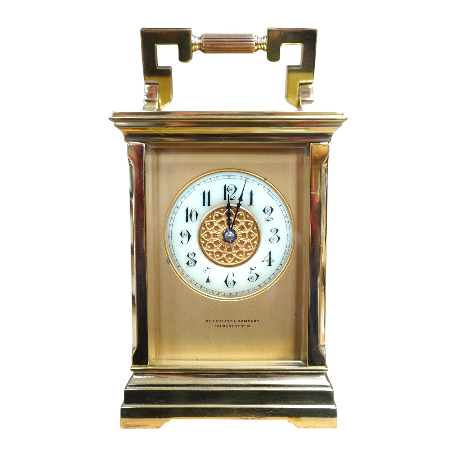 A brass cased carriage clock, the dial inscribed Shepheard & Company, no key, 18cm high. Condition - good, untested